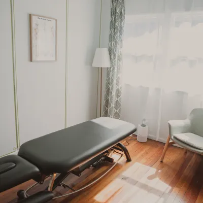 Massage table in treatment room