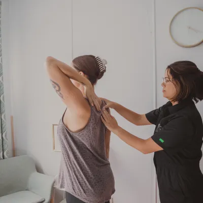 Palpating shoulder