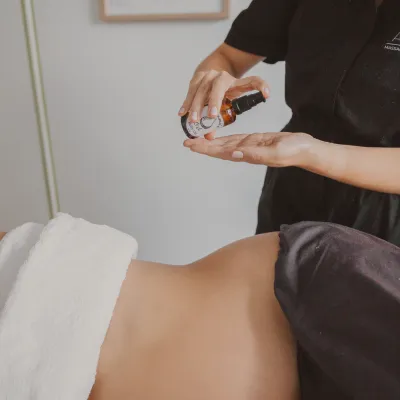 Pregnancy massage with essential oils